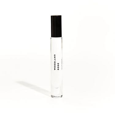 A clear roll-on bottle of Ranger Station Eau de Parfum with a black cap.